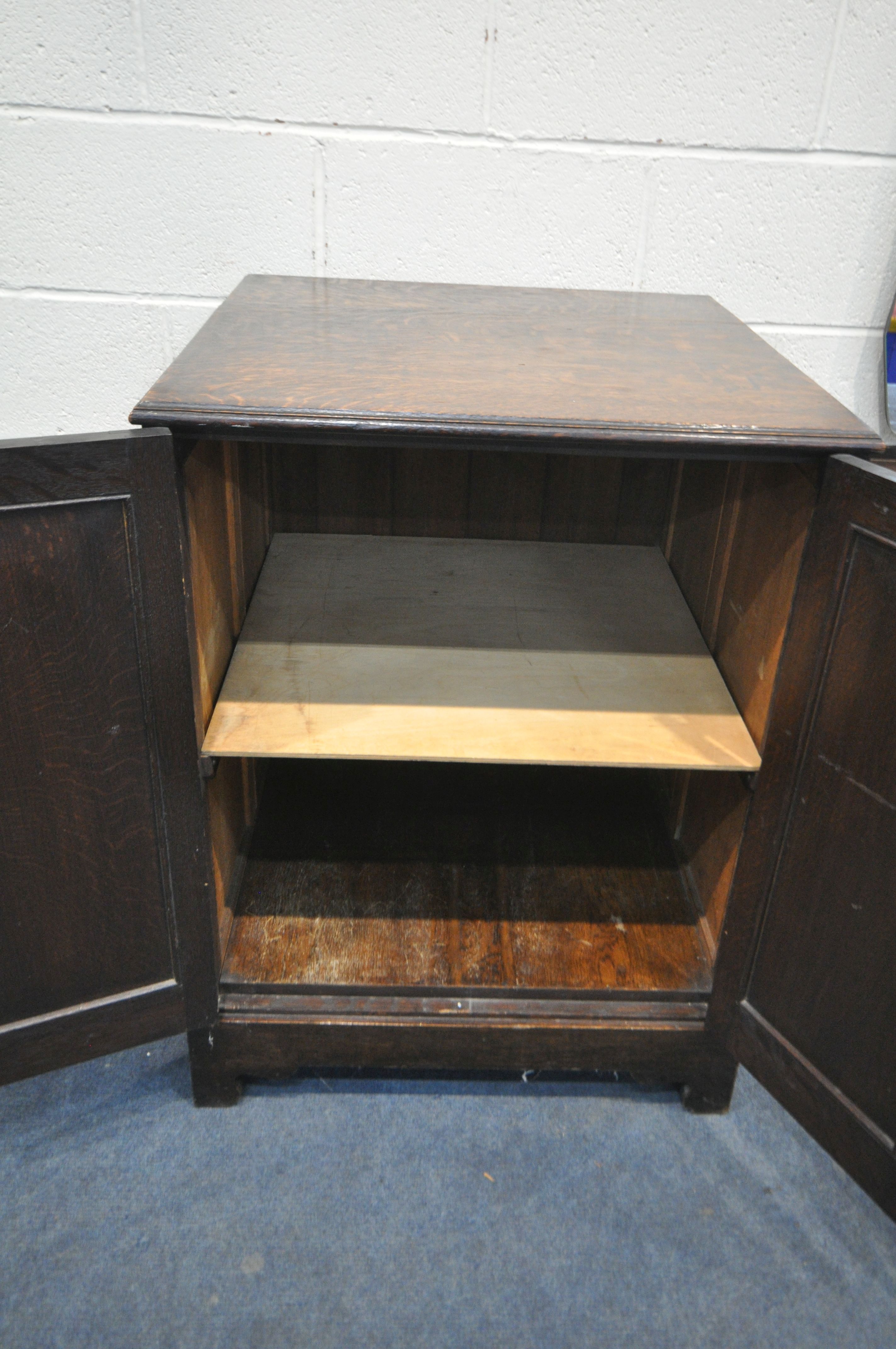 AN OAK PANELLED TWO DOOR CUPBOARD, 67cm squared x height 89cm, and an oak dressing chest with - Image 3 of 4