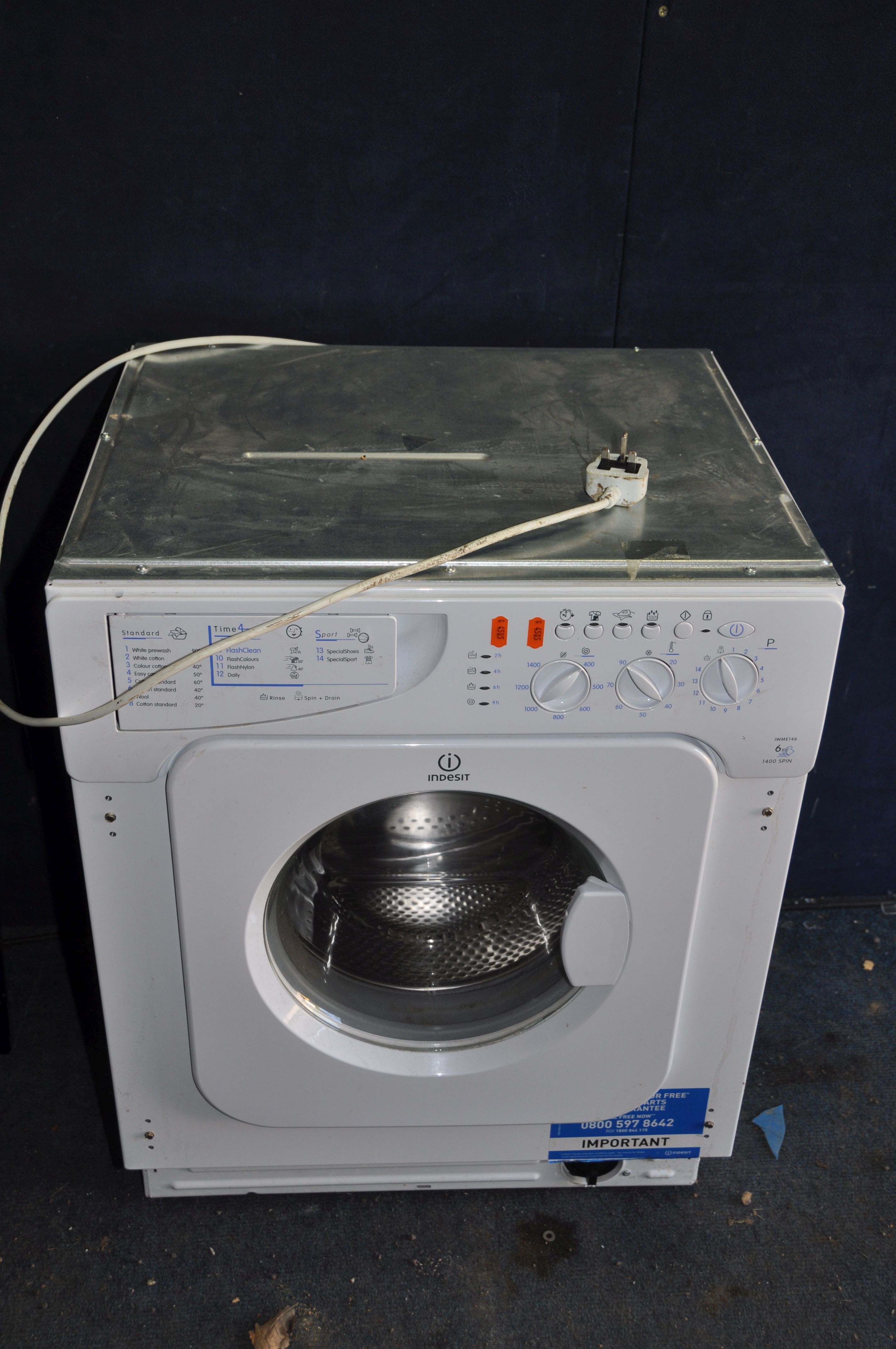 AN INDESIT IWME146 INTEGRATED WASHING MACHINE width 60cm depth 56cm height 83cm (PAT pass, spin