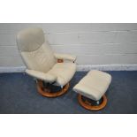 AN EKORNES STRESSLESS CREAM LEATHER SWIVEL RECLINING ARMCHAIR, along with a footstool (condition