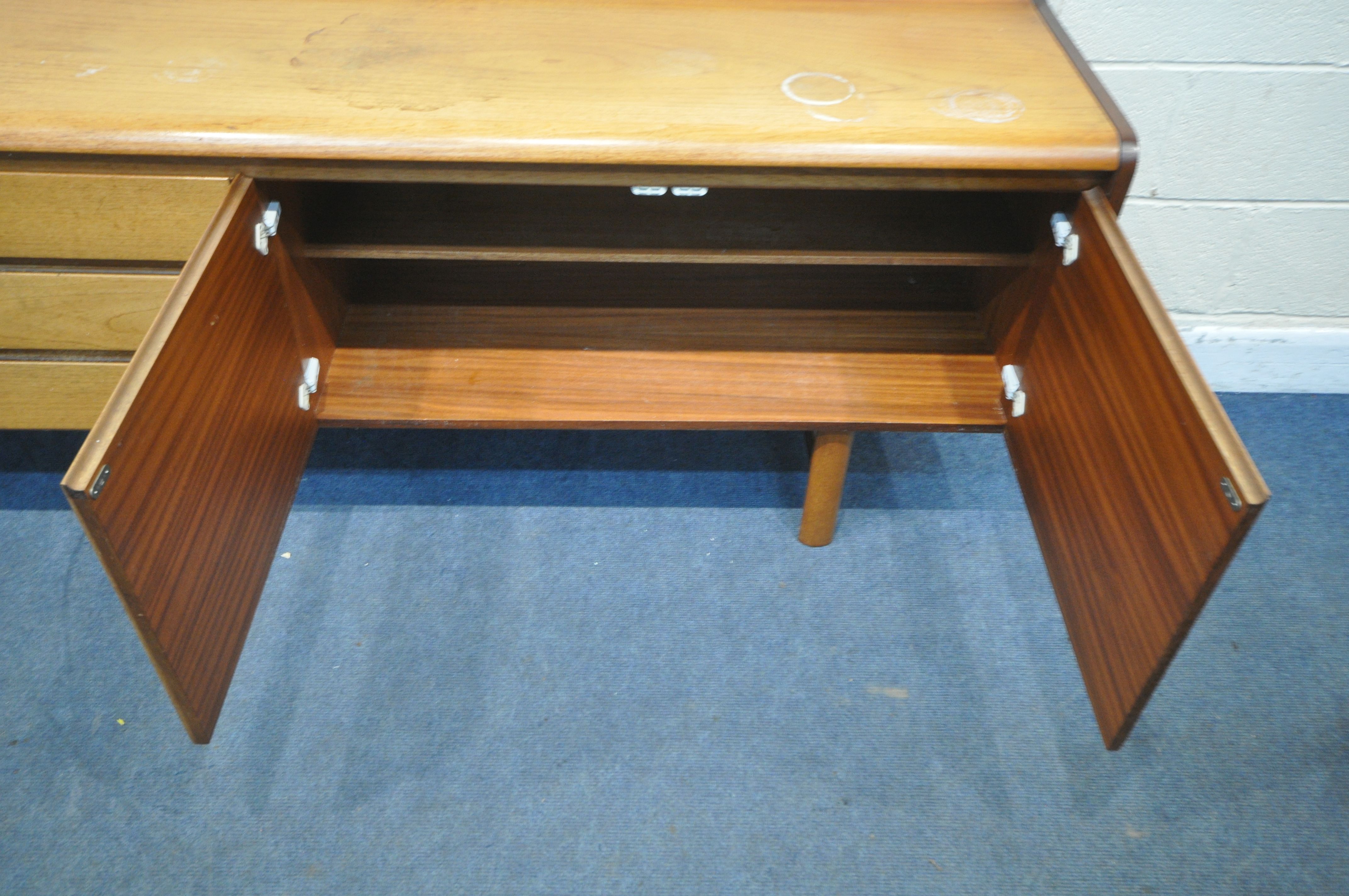 WHITE AND NEWTON LTD, A MID CENTURY TEAK SIDEBOARD, fitted with a fall front door, double cupboard - Image 6 of 9