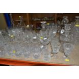 A LARGE VARIETY OF CRYSTAL CUT DECANTERS, GLASSES, ETC, including two 'Royal Brierley' vases and a