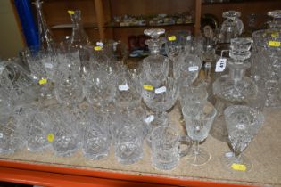 A LARGE VARIETY OF CRYSTAL CUT DECANTERS, GLASSES, ETC, including two 'Royal Brierley' vases and a