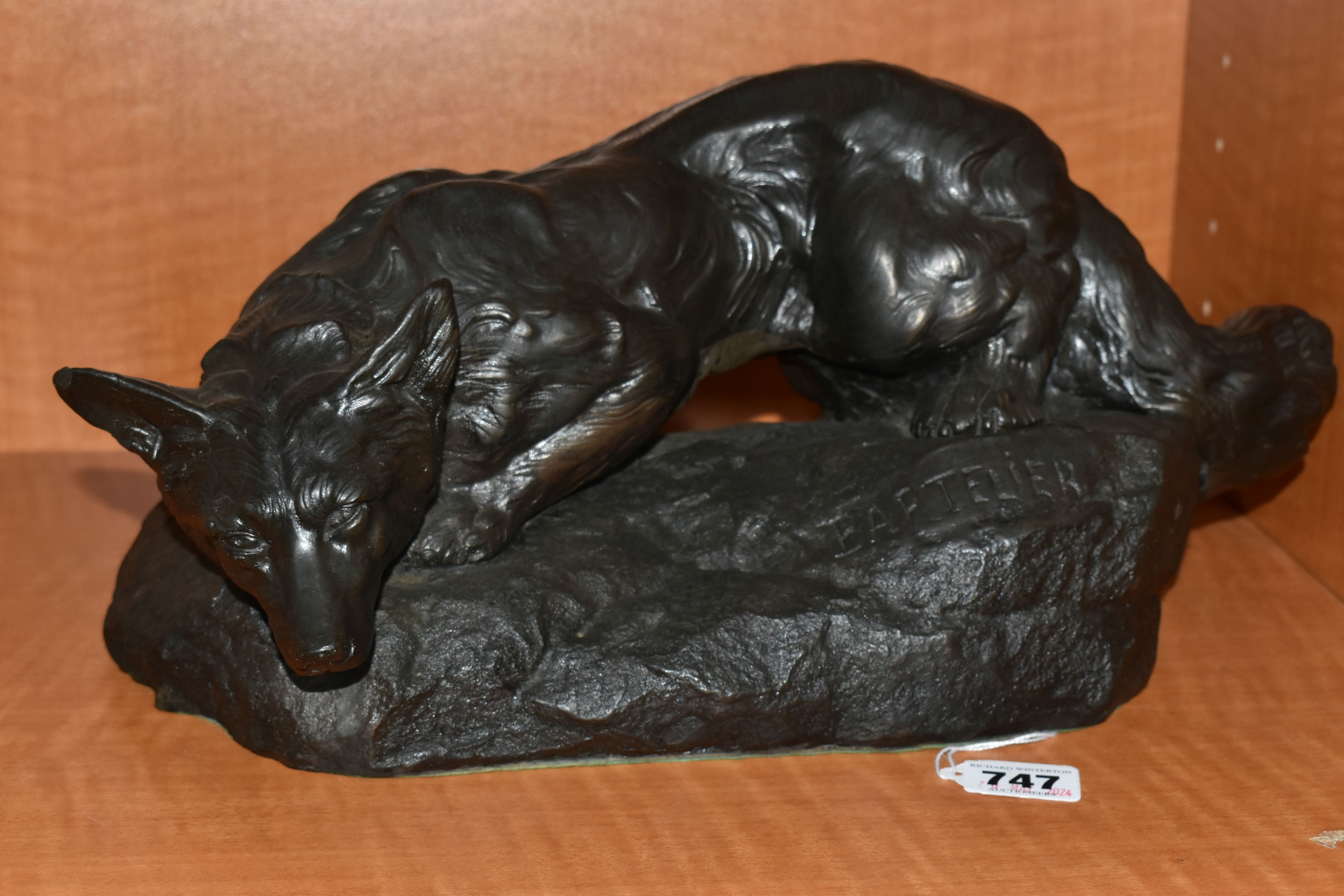 A BRONZED RESIN SCULPTURE OF A CROUCHING FOX, AFTER BARTELIER, cast on a naturalistic base, height