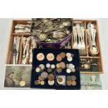 AN ASSORTMENT OF CUTLERY AND COINS, to include a selection of white metal cutlery, two guernsey