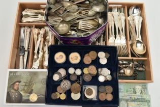 AN ASSORTMENT OF CUTLERY AND COINS, to include a selection of white metal cutlery, two guernsey