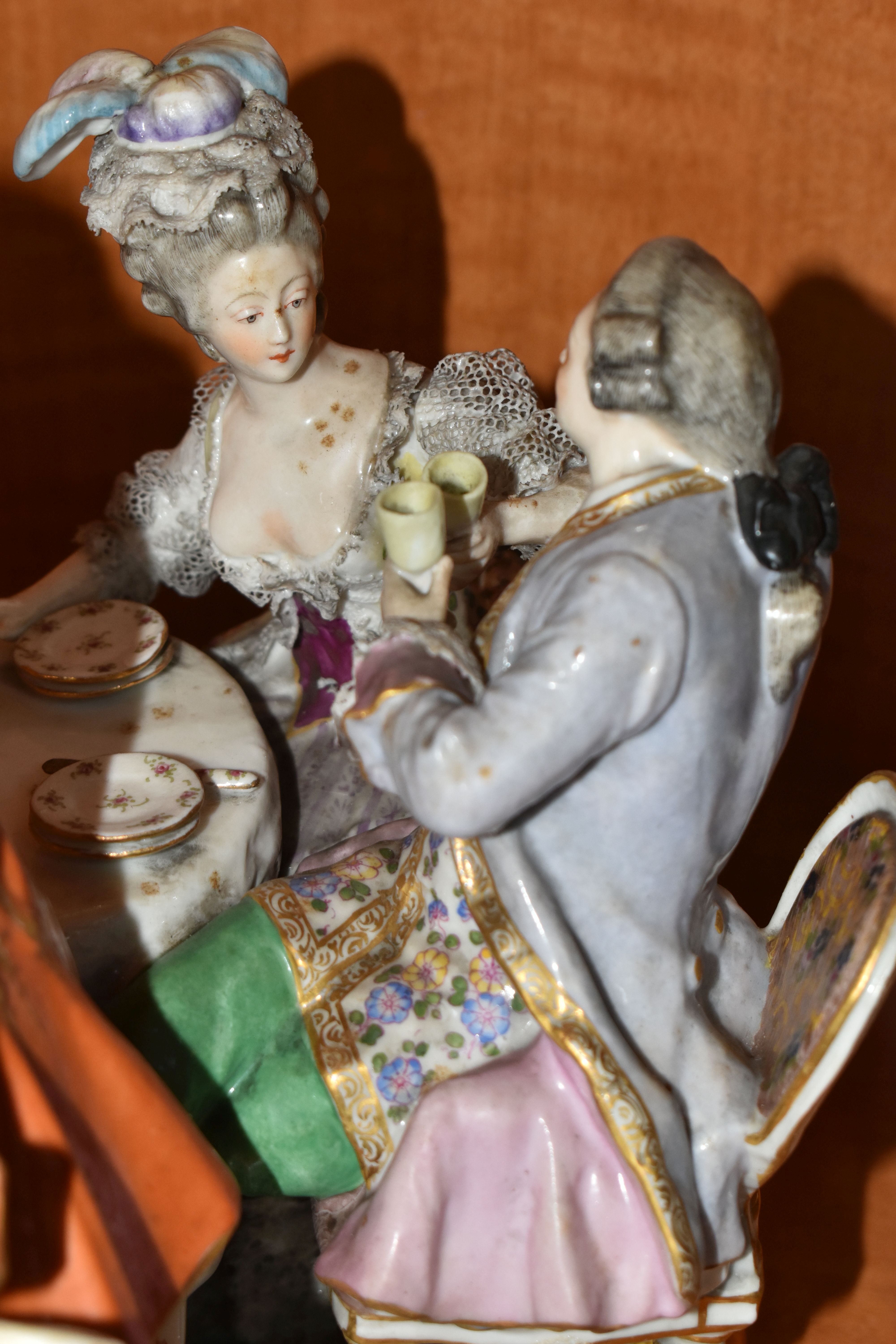 A 19TH CENTURY PARIS PORCELAIN FIGURE GROUP OF FIVE 18TH CENTURY FIGURES AROUND A DINING TABLE, with - Image 6 of 9