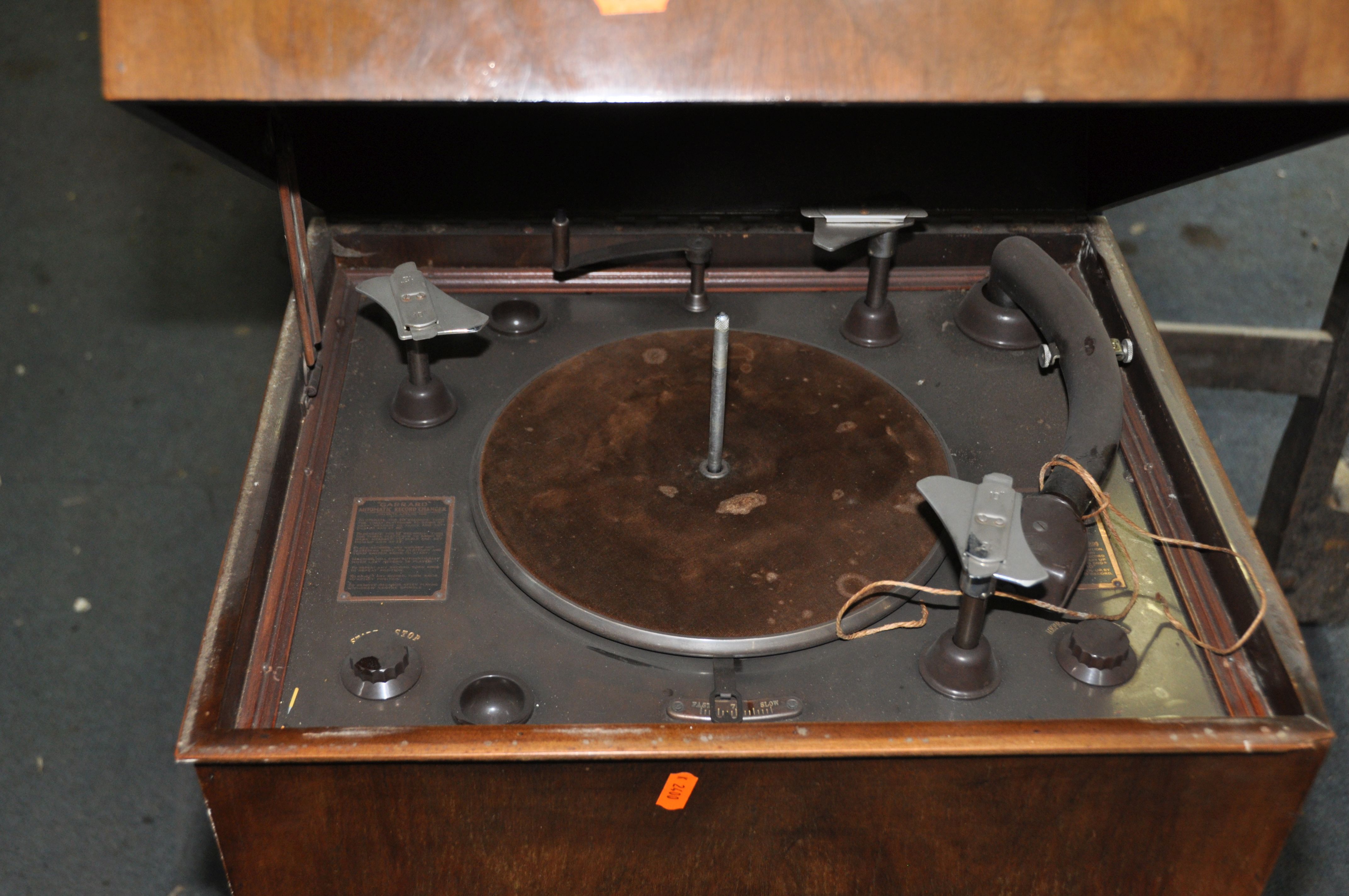 AN EARLY TO MID 20th CENTURY RADIOGRAM with a lidded walnut veneered cabinet, a Garrard 'Automatic - Image 2 of 4