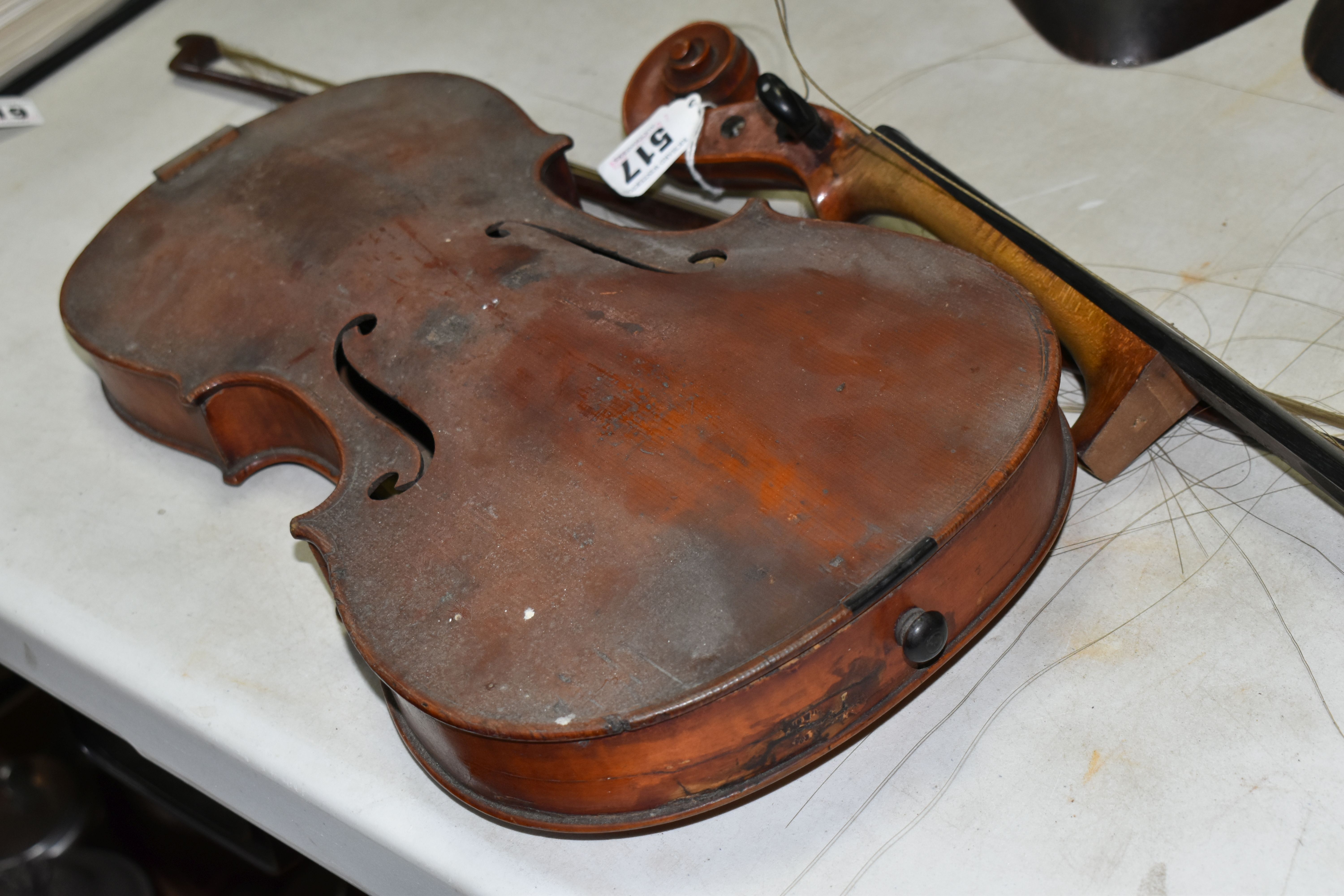 A VIOLIN IN NEED OF ATTENTION, two piece back, no visible maker's label but bears a label reading ' - Bild 3 aus 5