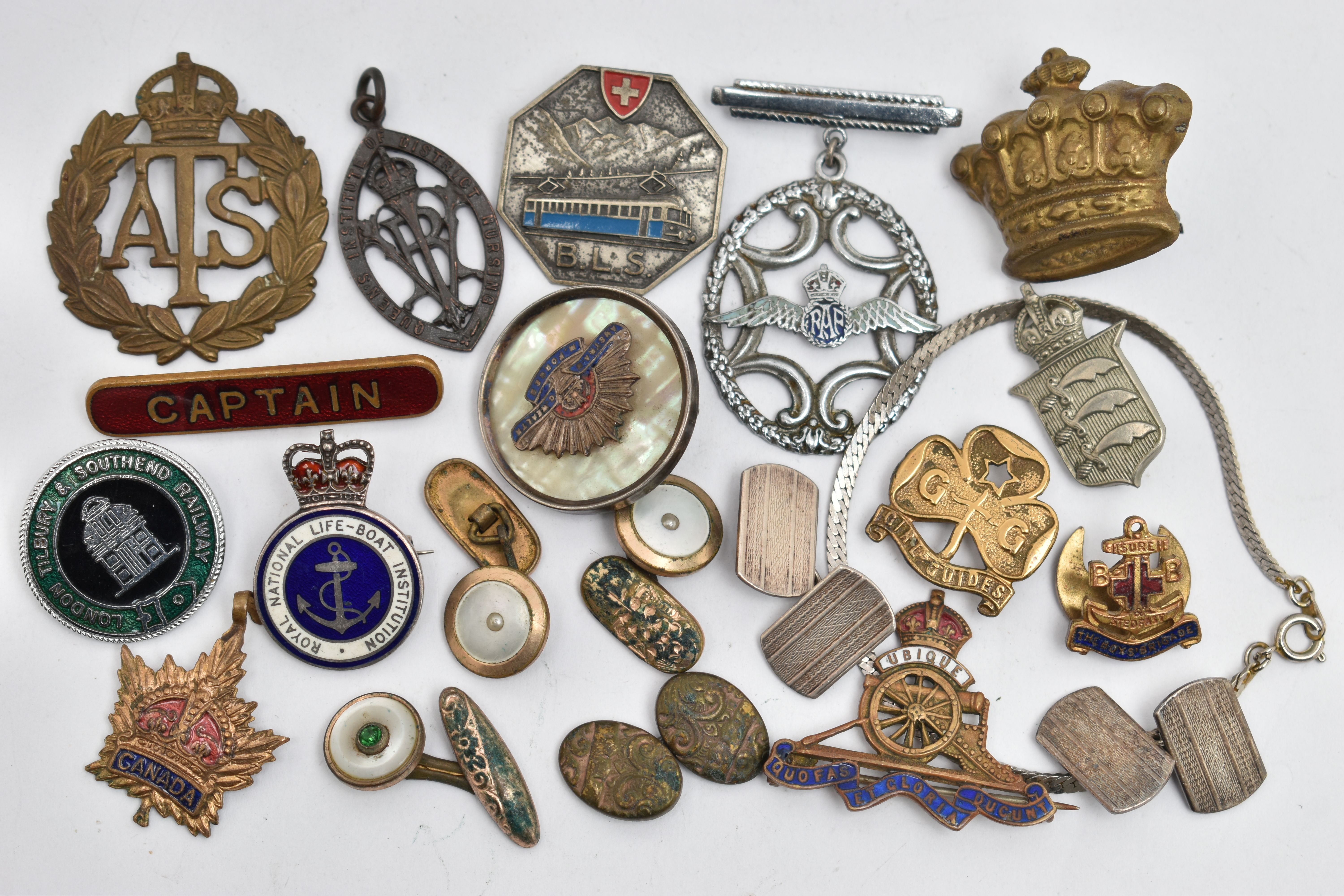 A SELECTION OF MAINLY BADGES, to include a pair of silver engine turned cufflinks, with silver