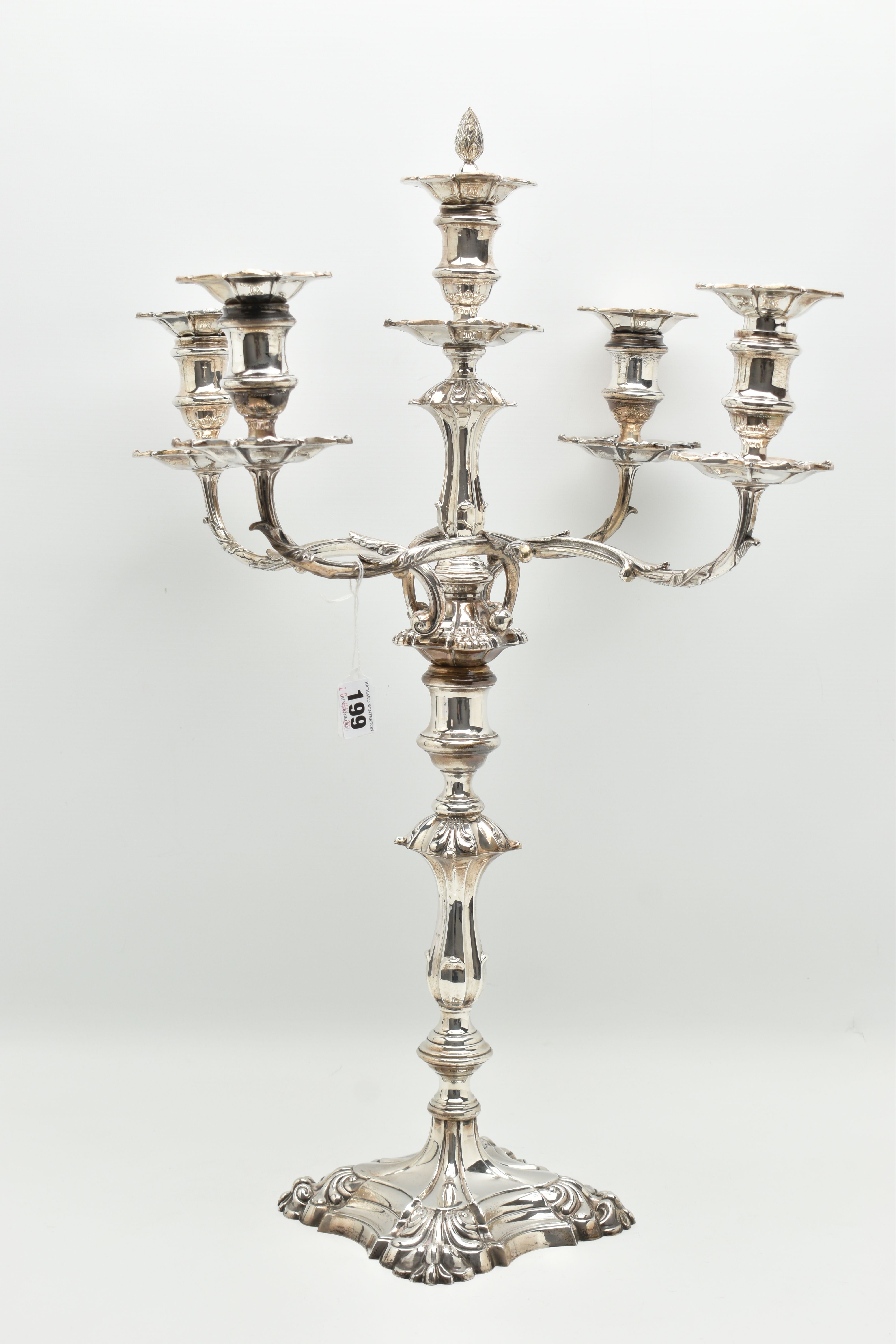 A GEORGE V SILVER FIVE LIGHT CANDELABRUM IN GEORGE II STYLE, with removable shaped square drip pans,