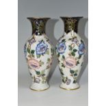 A PAIR OF FREDERICK RHEAD FOR WOOD AND SONS VASES, the pate sur pate baluster shaped vases decorated