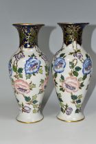 A PAIR OF FREDERICK RHEAD FOR WOOD AND SONS VASES, the pate sur pate baluster shaped vases decorated