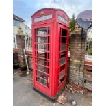 A RED K6 TELEPHONE BOX, the distinctive shape with a domed top, crown, and later fitted with Elvis