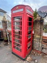 A RED K6 TELEPHONE BOX, the distinctive shape with a domed top, crown, and later fitted with Elvis