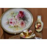 A ROYAL DOULTON CABINET DISH WITH A ROYAL WORCESTER CUP AND SAUCER, comprising an oval dish with