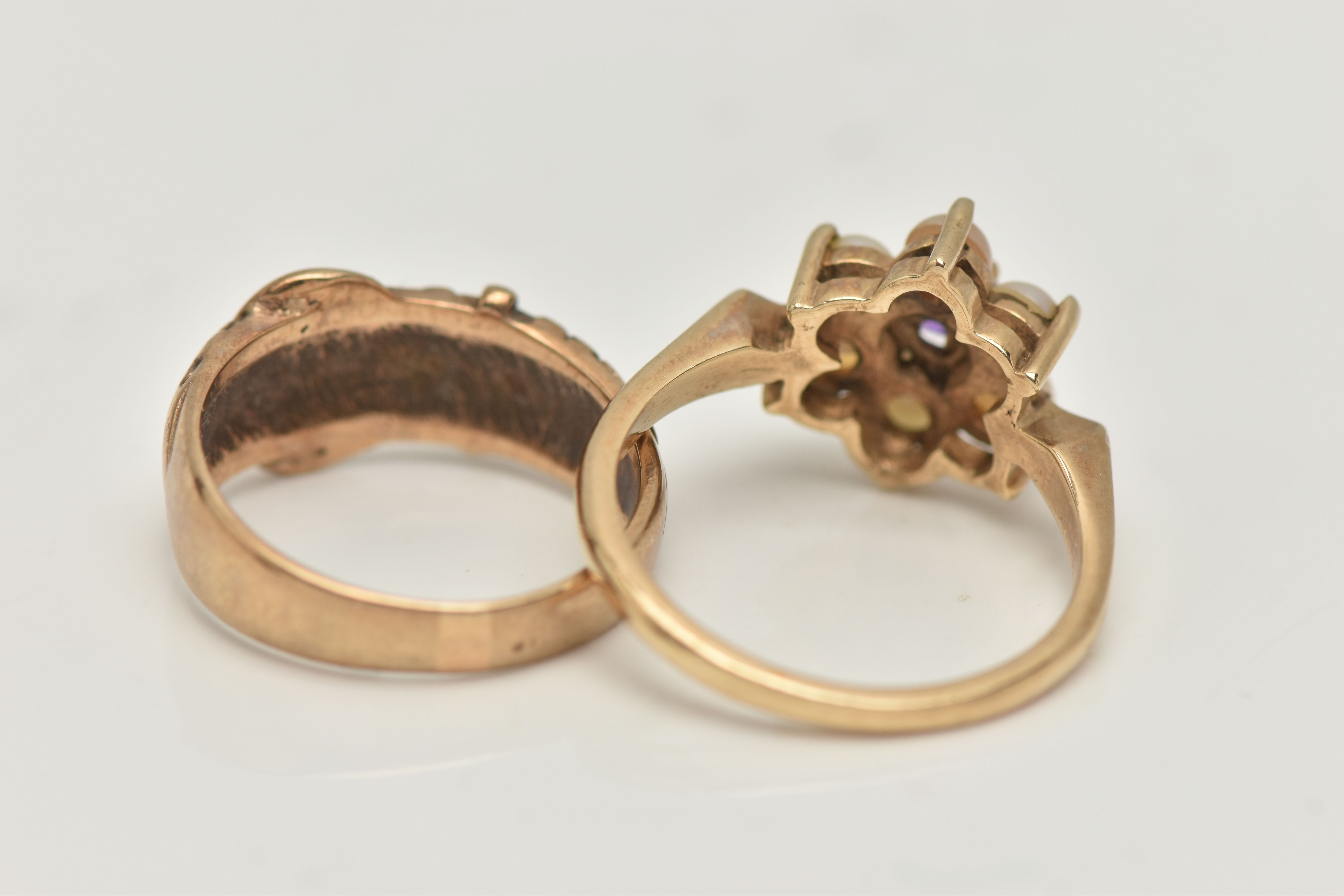 A 9CT GOLD RING AND A GEM SET RING, a 9ct gold buckle ring with floral detail, hallmarked 9ct London - Bild 4 aus 4