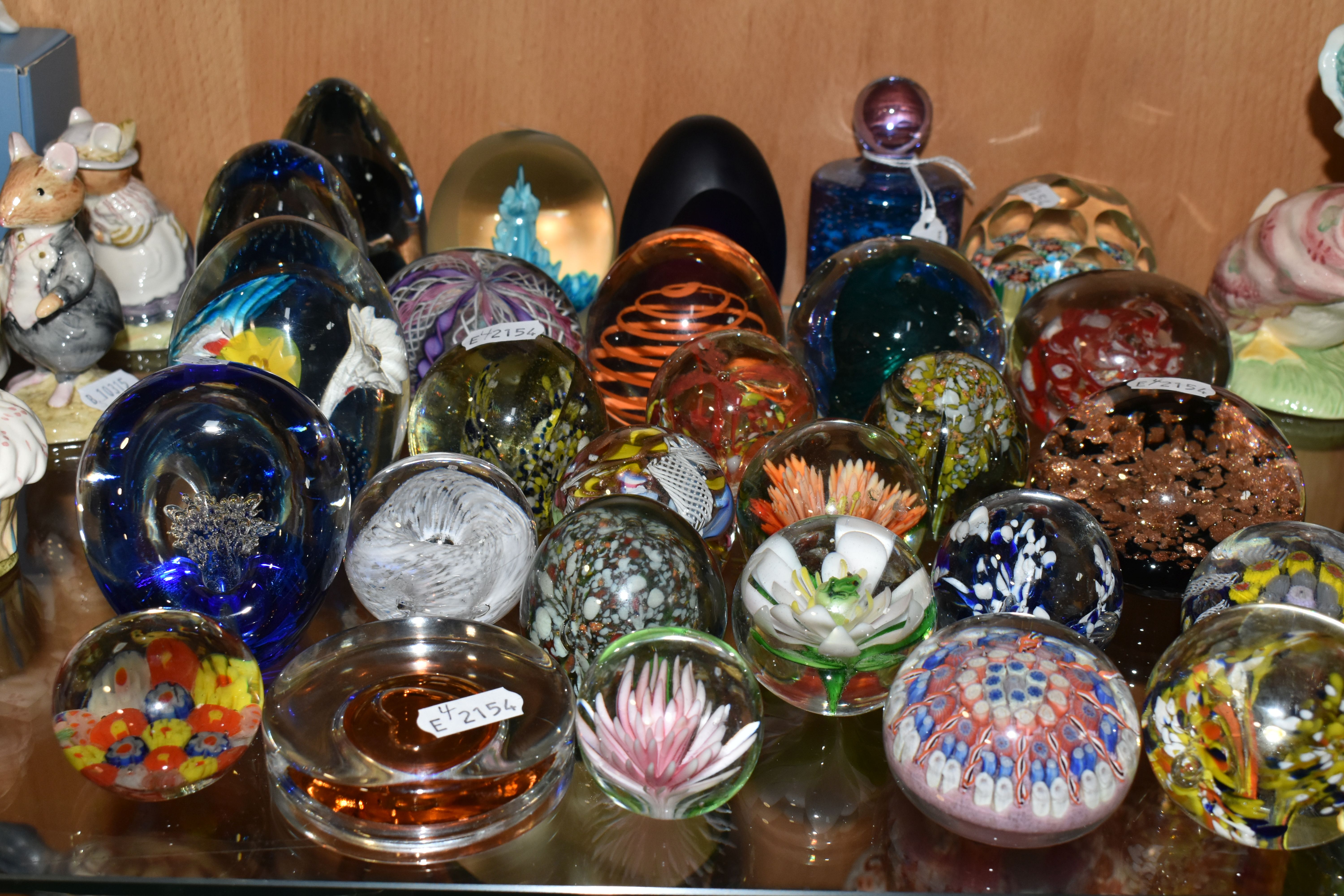 TWENTY EIGHT PAPERWEIGHTS, including millefiori, latticino, controlled bubbles, faceted, metallic