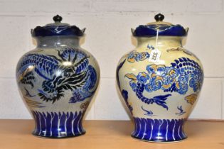 TWO ROYAL CAULDON/CAULDON WARE COVERED JARS, decorated with dragons on blue-grey and beige patterned