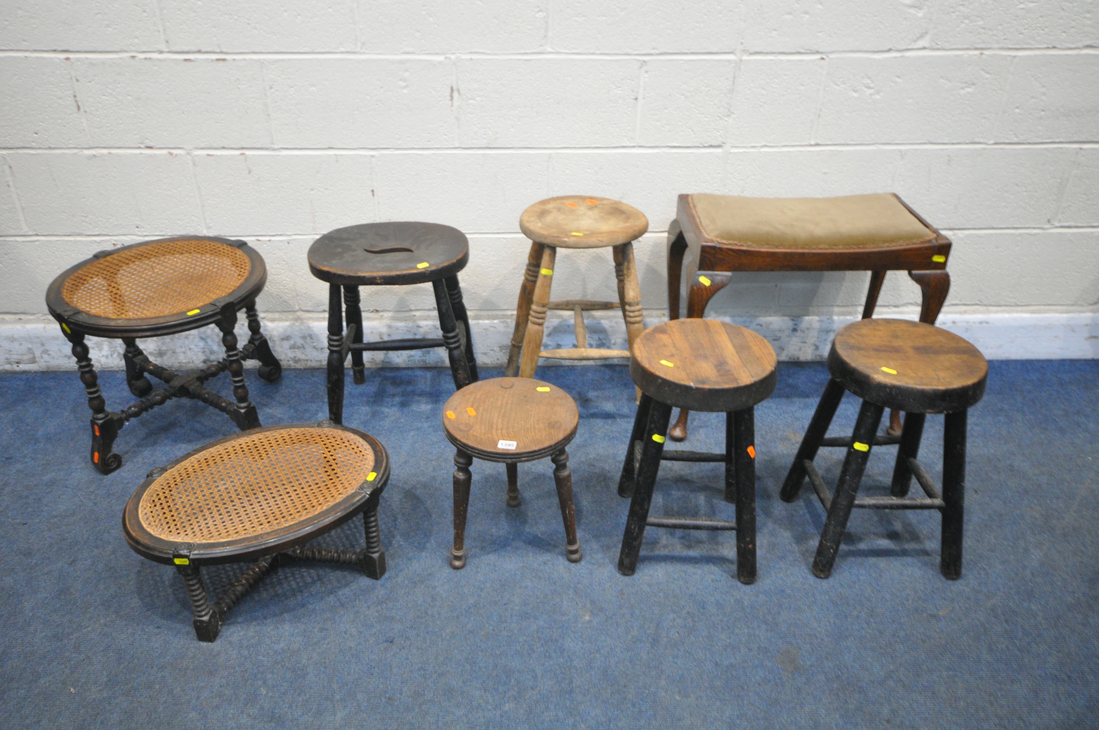 A SELECTION OF STOOLS, of various ages and styles, to include a circular and oval bergère stool,