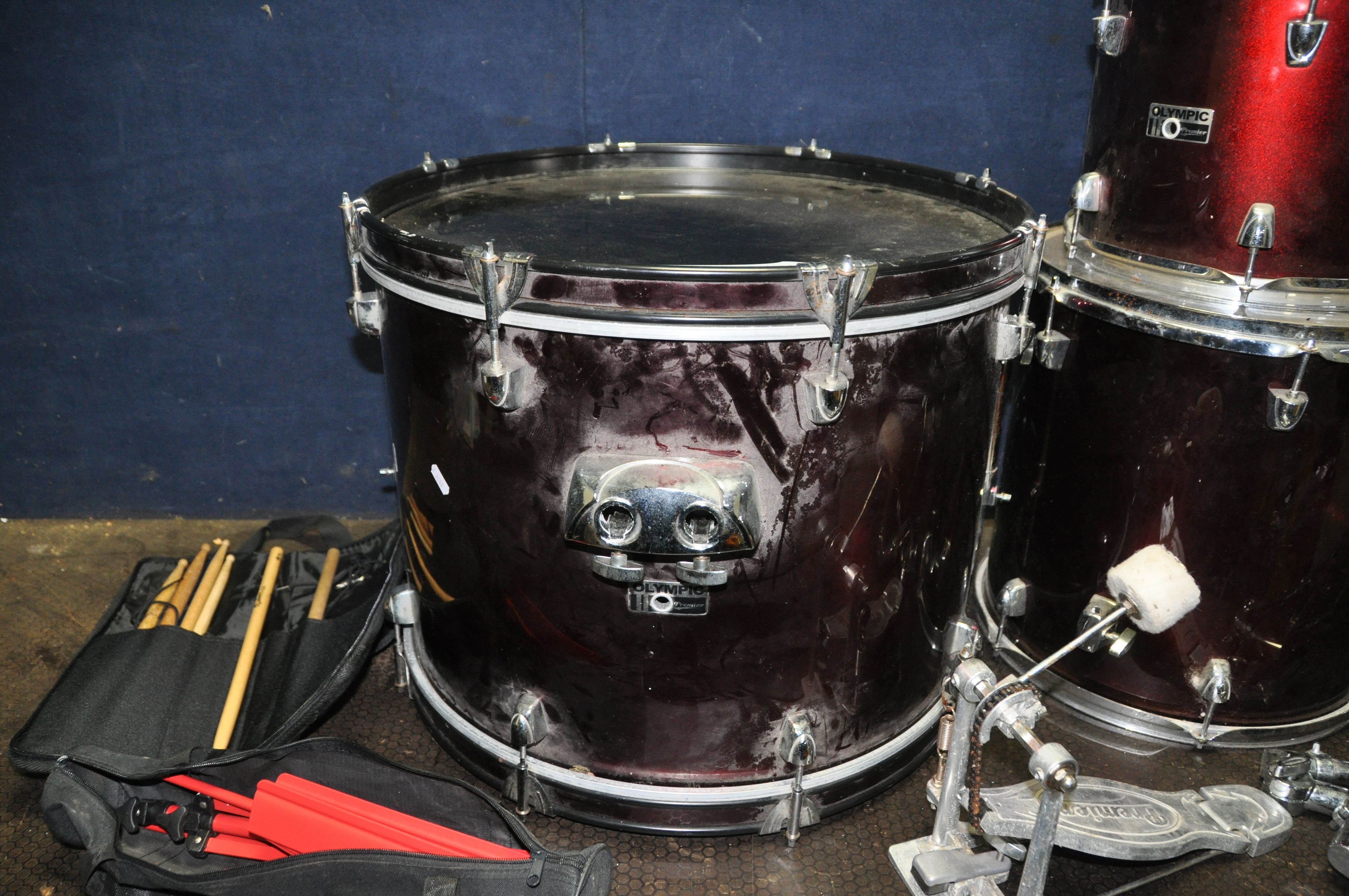 AN OLYMPIC BY PREMIER FOUR PIECE DRUM KIT in metallic red finish comprising of a 22in x 16in Kick - Image 3 of 6