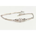 A DIAMOND BRACELET, the central openwork panel set with an old cut diamond flanked by three rose cut