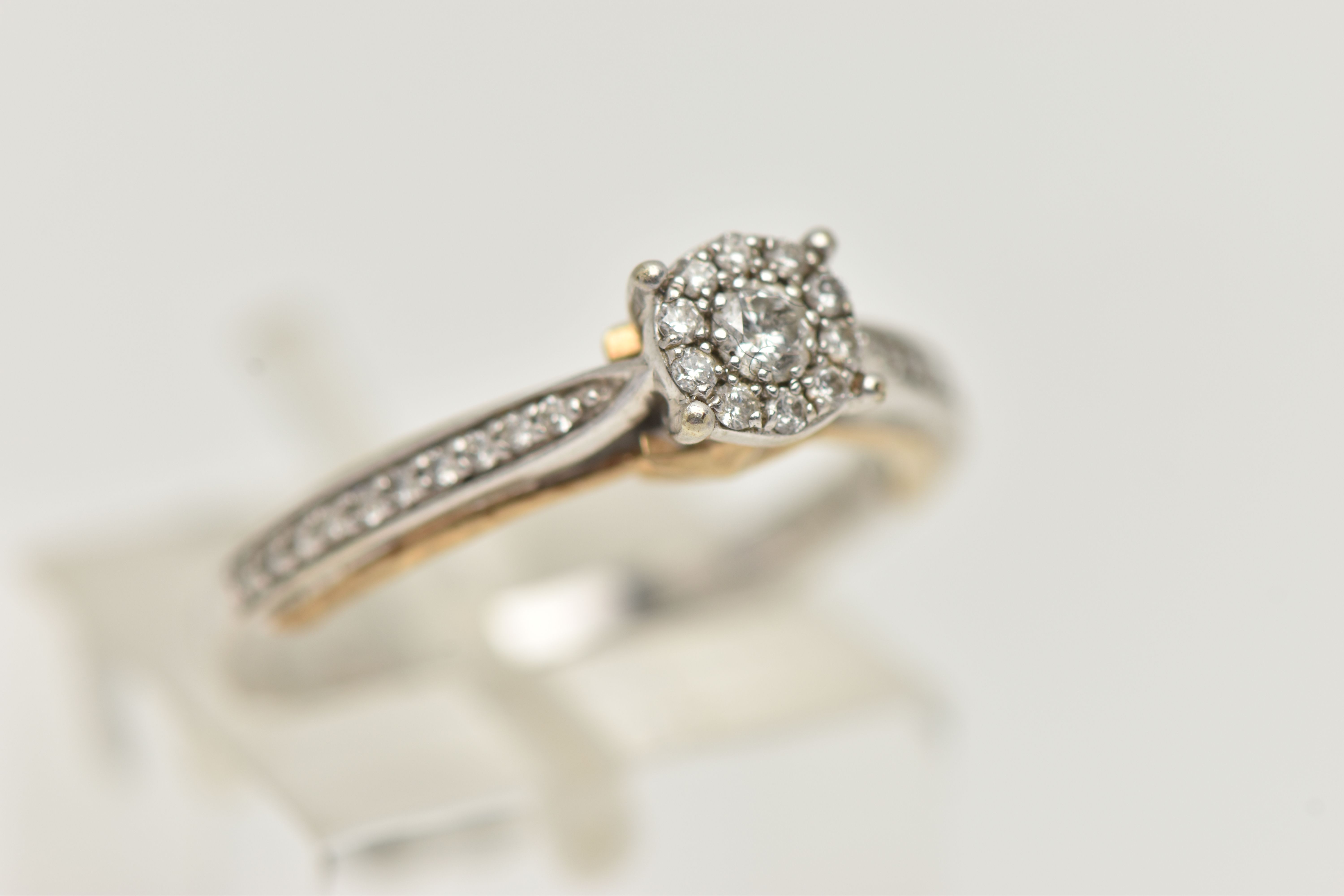 A 9CT WHITE GOLD DIAMOND RING, designed as a central brilliant cut diamond within a brilliant cut - Image 4 of 4