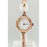 AN EARLY 20TH CENTURY LADIES WRISTWATCH, hand wound movement, round dial, Arabic numerals, rose gold