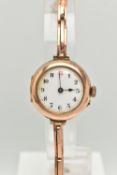 AN EARLY 20TH CENTURY LADIES WRISTWATCH, hand wound movement, round dial, Arabic numerals, rose gold