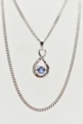 A TANZANITE AND DIAMOND PENDANT AND 9CT WHITE GOLD CHAIN, the pendant designed as a circular