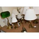 A QUANTITY OF ASSORTED BRASS TABLE AND DESK LAMPS, majority are have various candlestick type bases,