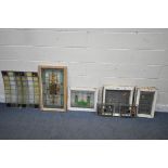 A SELECTION OF STAINED / COLOURED GLASS WINDOWS, to include a window with a Fleur De Lis design,