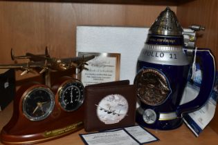 AN APOLLO 11 STEIN, LANCASTER DESK CLOCK AND HEROES OF THE SKY WALLET, all by The Bradford Exchange,