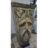 A WEATHERED COADE STONE KEYSTONE, modelled of a classical bearded male mask, stamped M to the top,