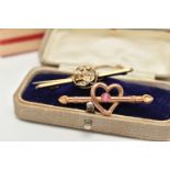 TWO EARLY 20TH CENTURY BROOCHES, the first an open work heart with bar set with a single pink