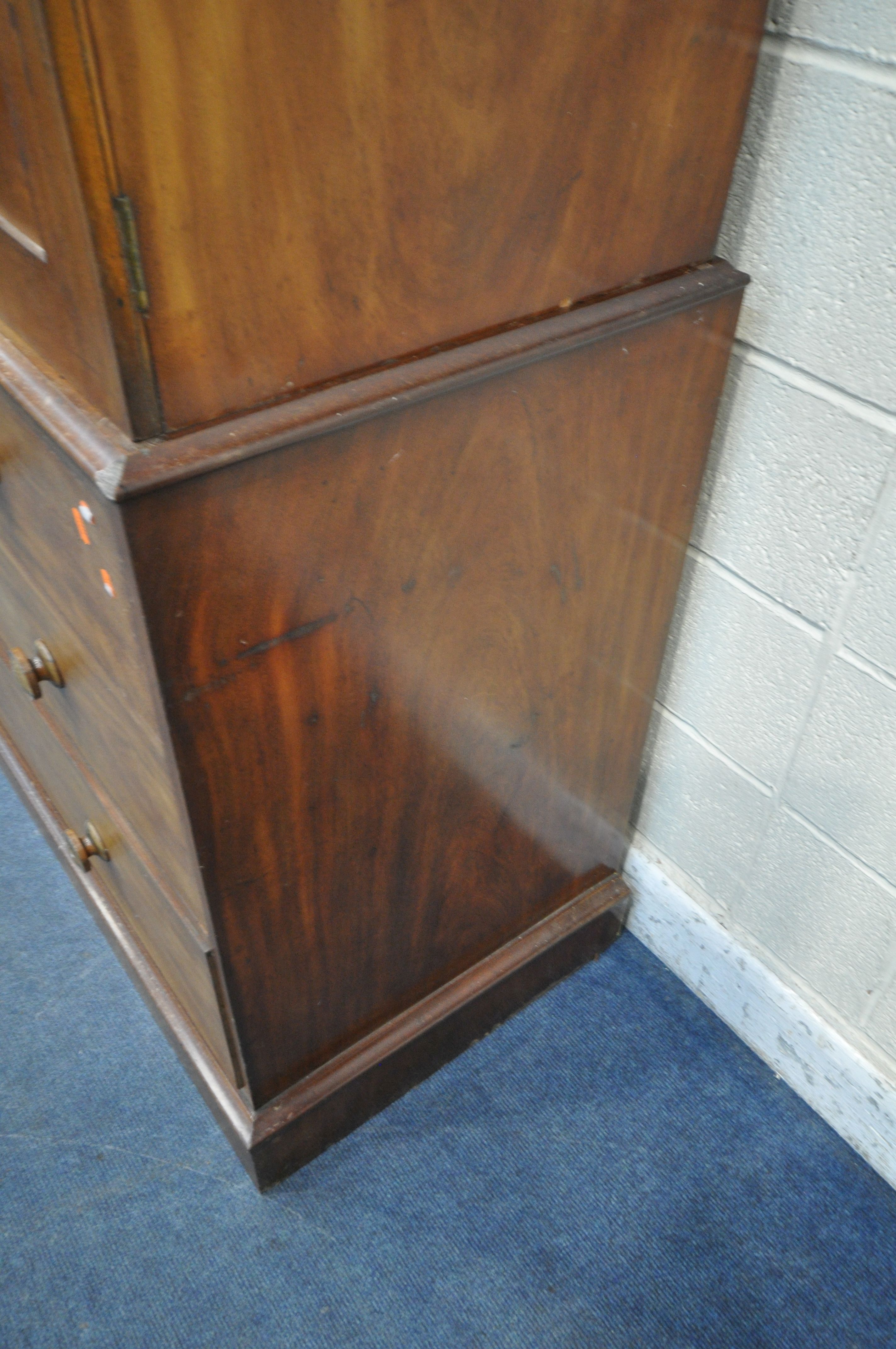 A 19TH CENTURY MAHOGANY LINEN PRESS, with a loose overhanging cornice, the double doors enclosing - Image 6 of 6