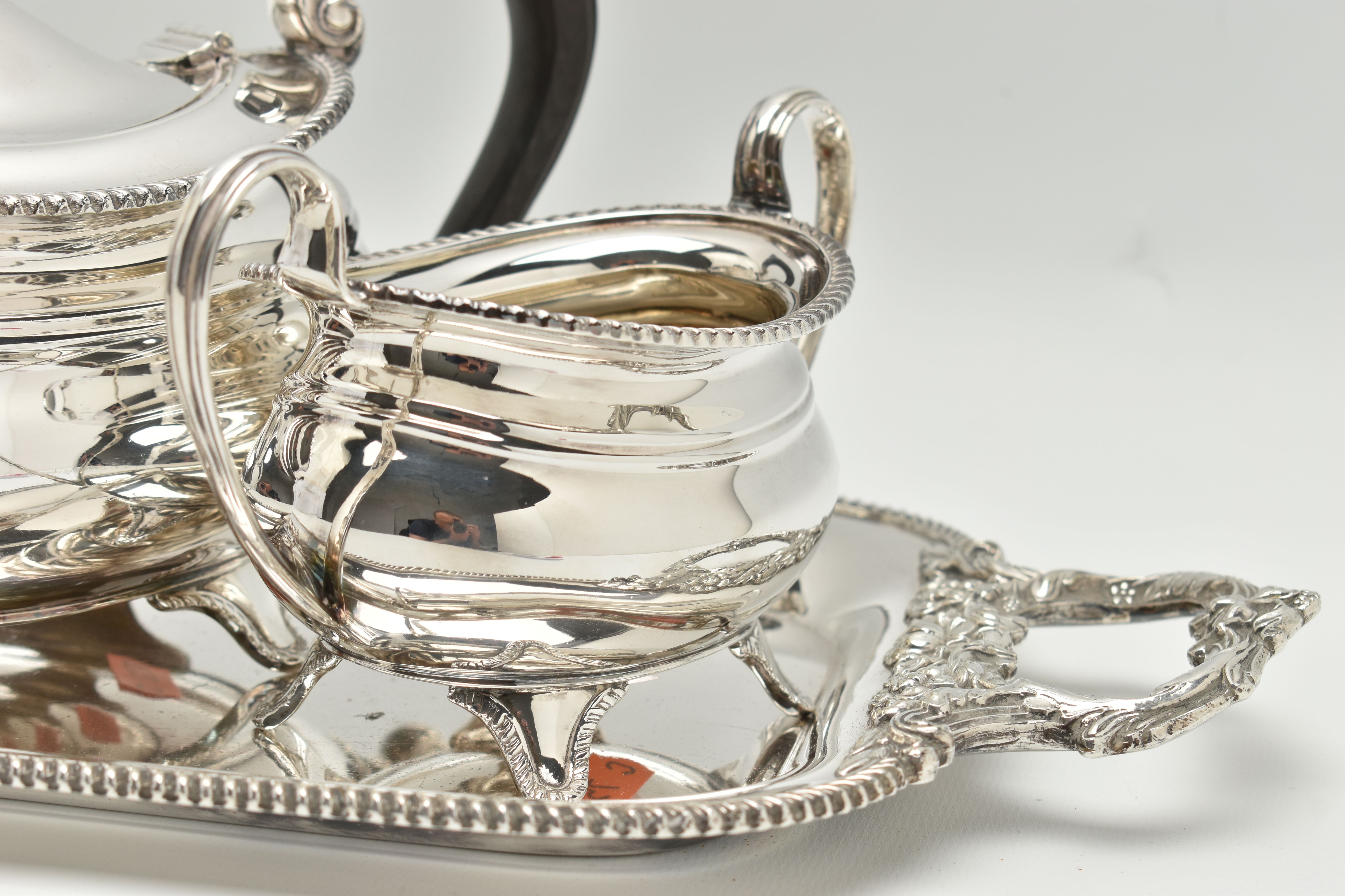 A FOUR PIECE SILVER PLATED TEA SET WITH TRAY, comprising of a polished teapot, coffee pot, sugar - Image 4 of 9