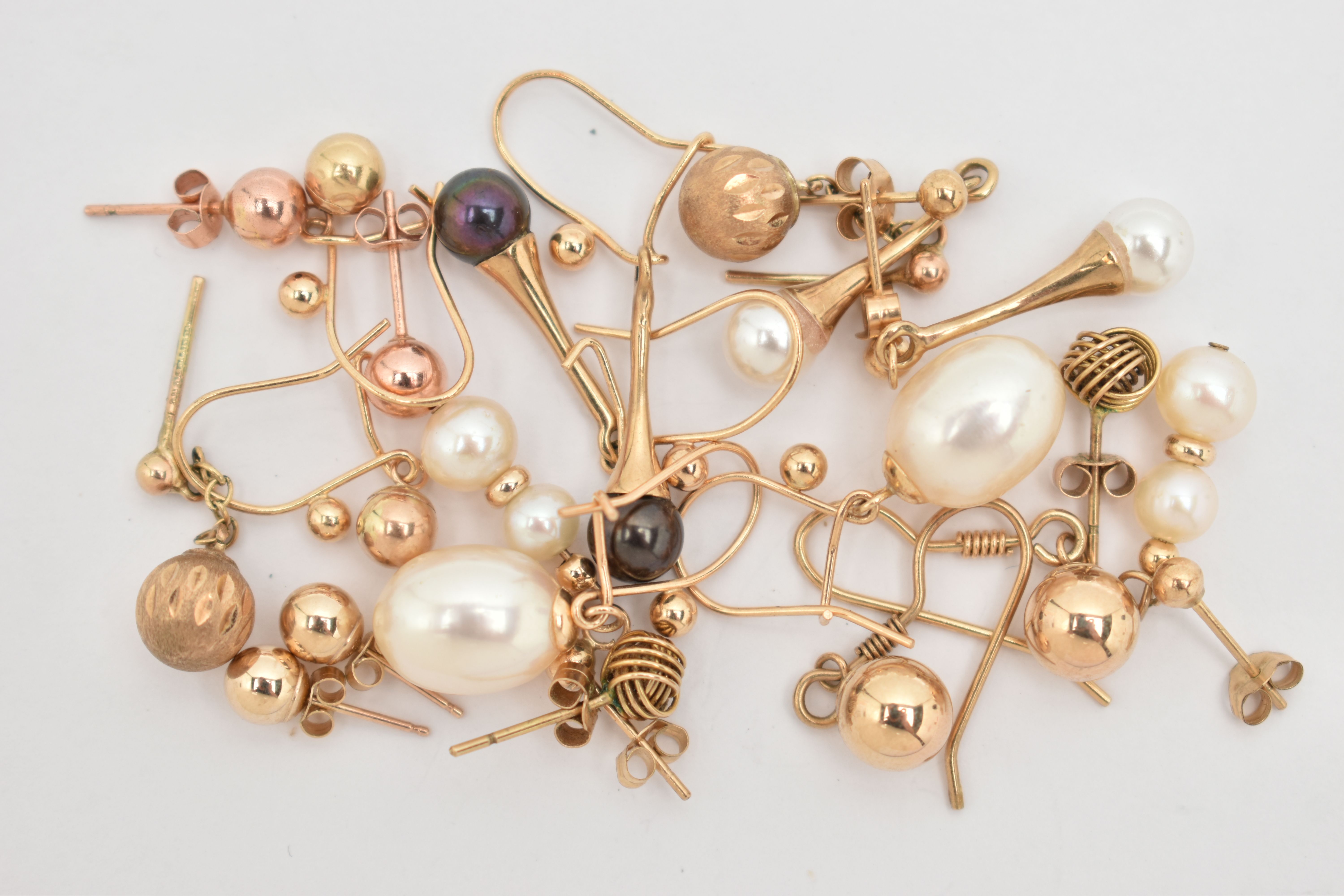 AN ASSORTMENT OF EARRINGS, ten pairs of yellow metal earrings, four pairs set with imitation pearls,