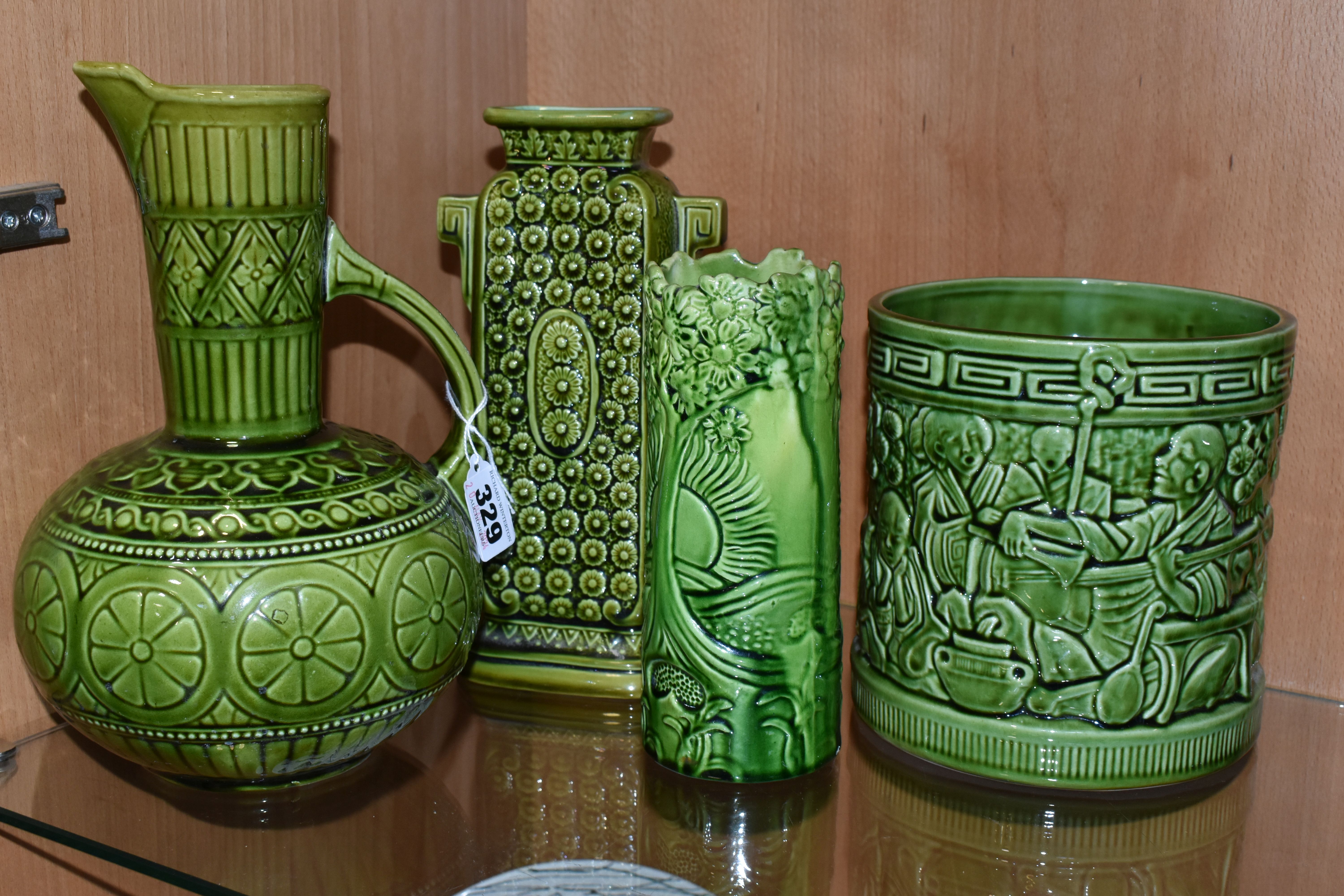 FOUR PIECES OF GREEN GLAZED POTTERY, comprising a Lear green glazed jug marked 'Lear 145', a Lear