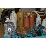 A GROUP OF EARLY 20TH CENTURY STONEWARE BOTTLES AND OTHER SUNDRIES, comprising four stoneware