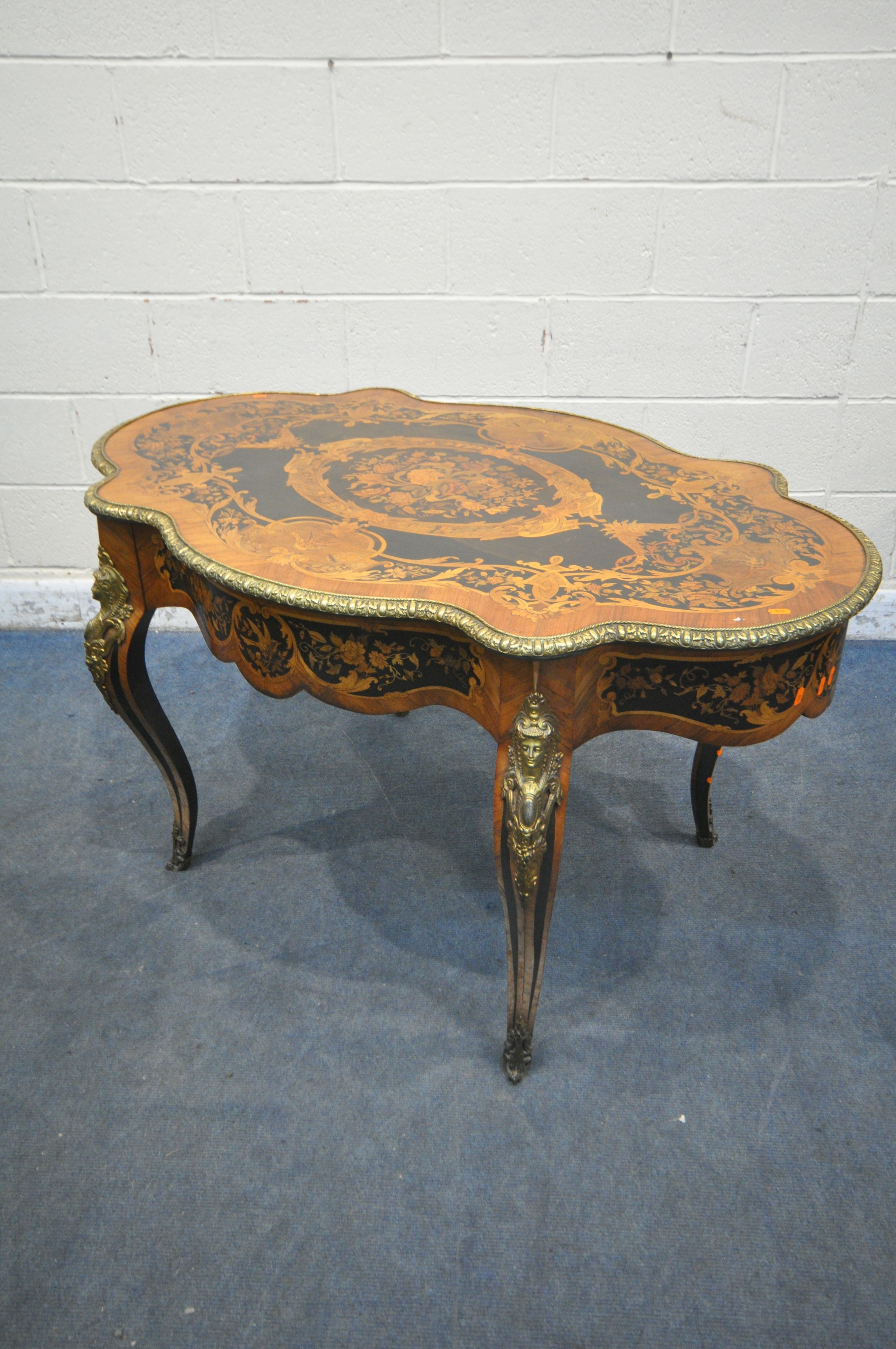 A LOUIS XVI STYLE KINGWOOD, EBONY AND MARQUETRY INLAID CENTRE TABLE, late 19th century, the and