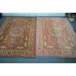 TWO 20TH CENTURY SYNTHETIC SILK RUGS, of two colours and intricate designs, 182cm x 145cm (condition