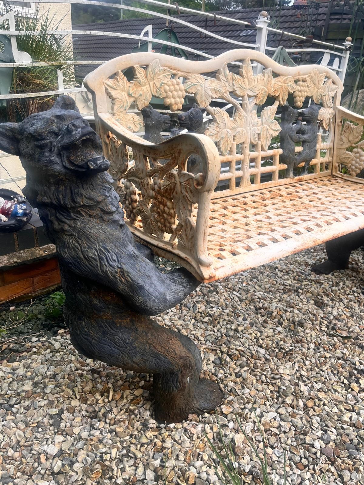 A CAST IRON BLACK FOREST STYLE GARDEN BENCH, the seat is supported by two angry black bears, the - Image 3 of 9