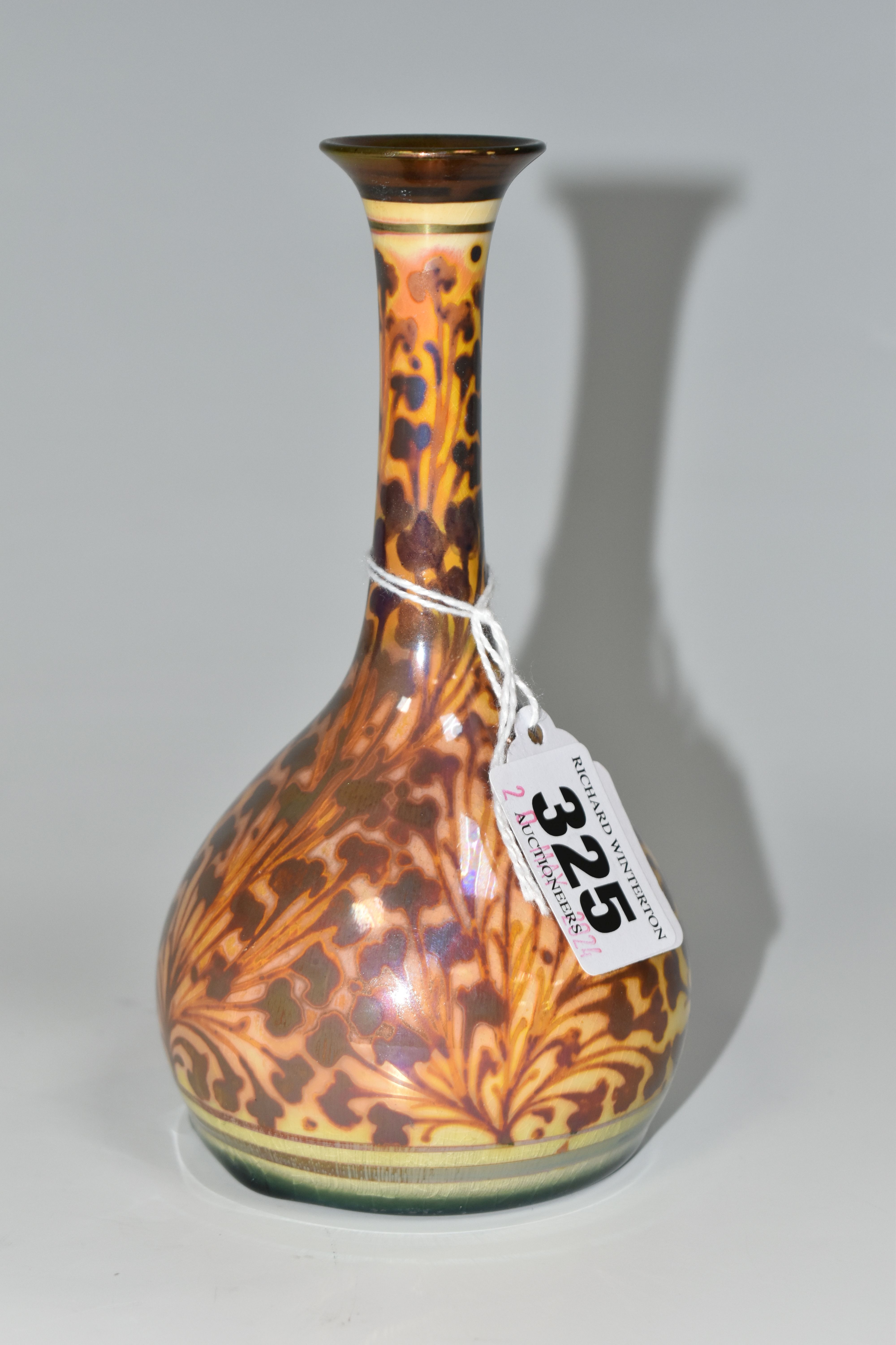A PILKINGTON'S BUD VASE, with foliate decoration on a yellow ground, model no 2598, impressed P