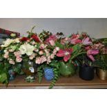 A LARGE QUANITY OF ARTIFICIAL PLANTS IN CERAMIC AND GLASS VASES, approximately 20 faux flowers of