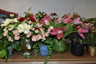 A LARGE QUANITY OF ARTIFICIAL PLANTS IN CERAMIC AND GLASS VASES, approximately 20 faux flowers of