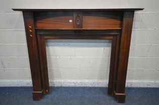 A MAHOGANY FIRE SURROUND, width 153cm x height 139cm (condition report: pieces cut out to fit in a