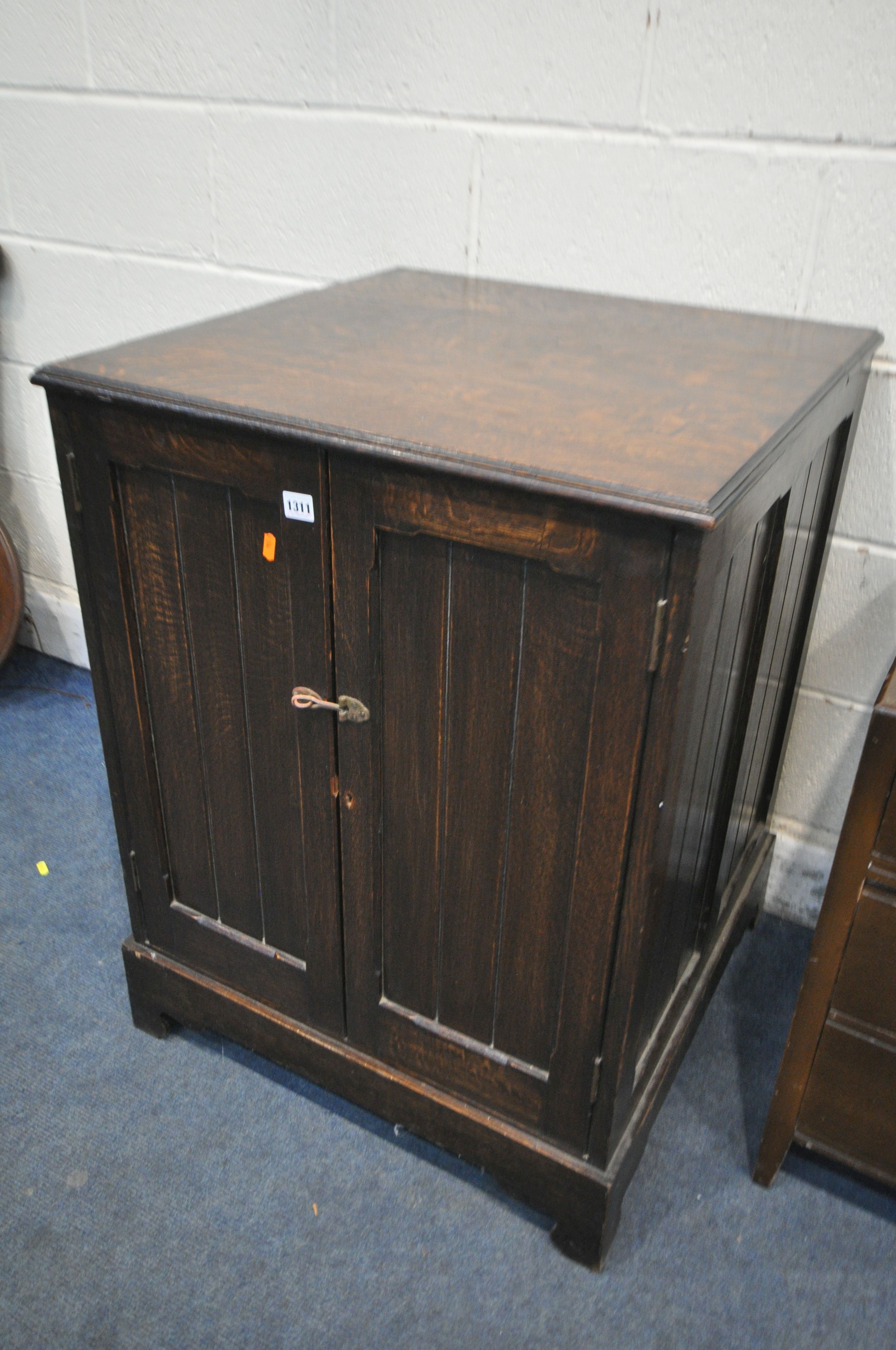 AN OAK PANELLED TWO DOOR CUPBOARD, 67cm squared x height 89cm, and an oak dressing chest with - Image 2 of 4