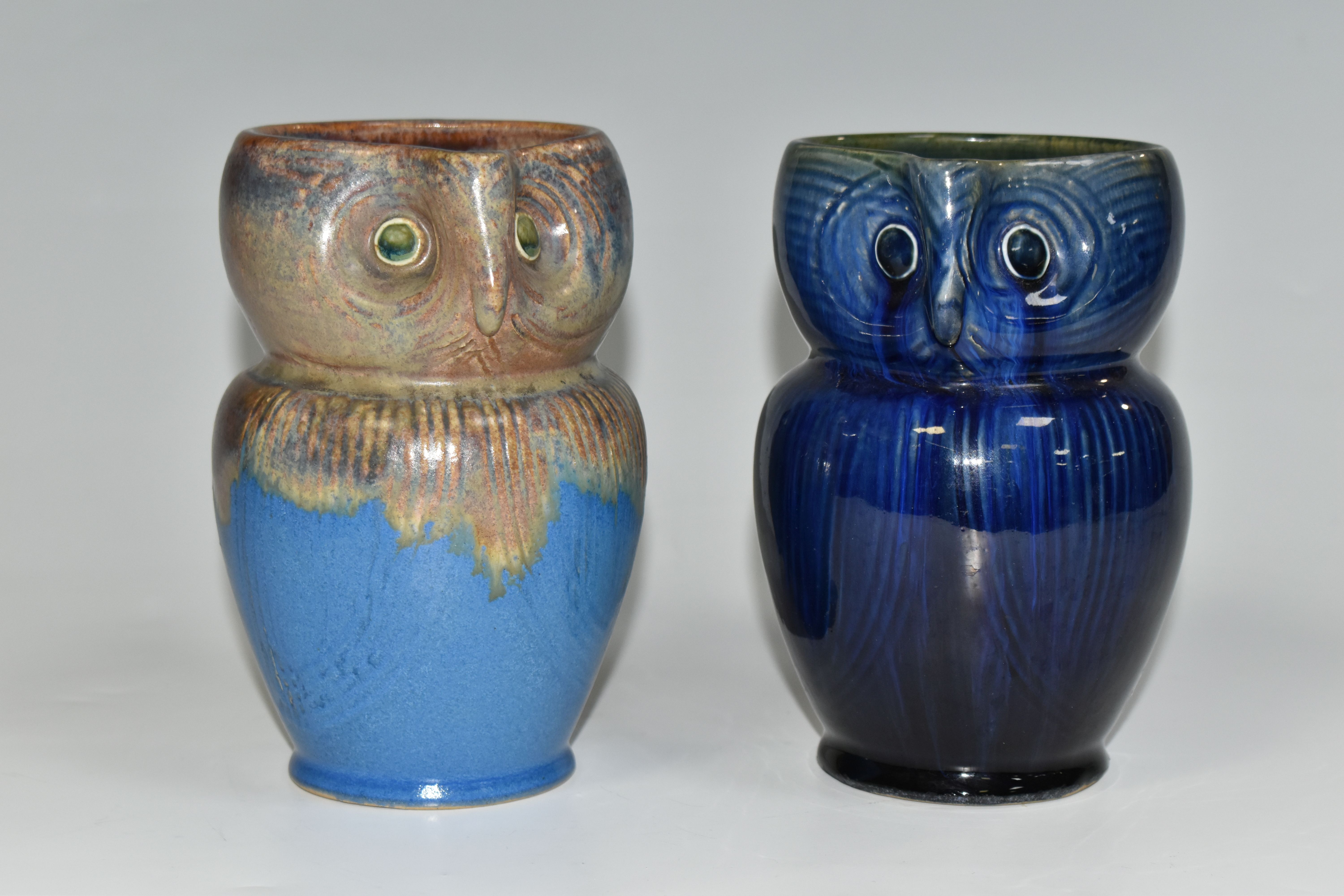 TWO BOURNE DENBY OWL JUGS, 1920s-1930s Danesby Ware, one with mid blue and brown glaze, the other