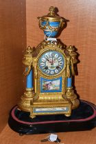 A SECOND HALF 19TH CENTURY GILT METAL AND PORCELAIN MANTEL CLOCK, urn finial, the case with two