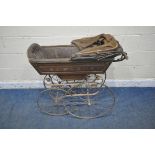 A VICTORIAN PERAMBULATOR, with painted wooden body, leatherette upholstery, folding canopy, raised